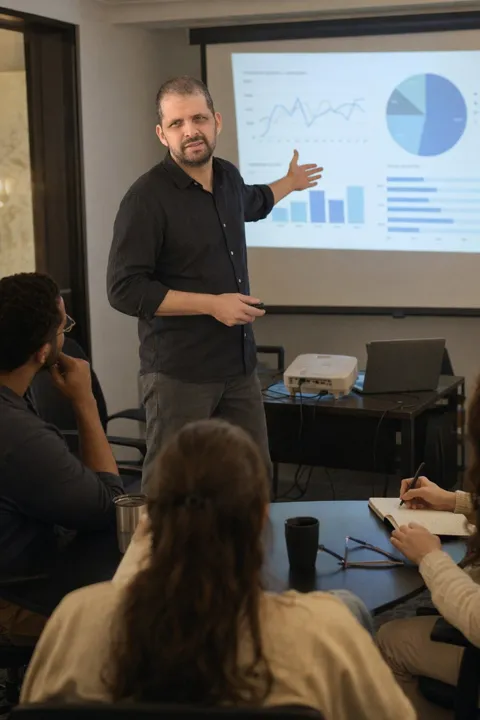 AI LinkedIn photo example: presenting charts from a projector