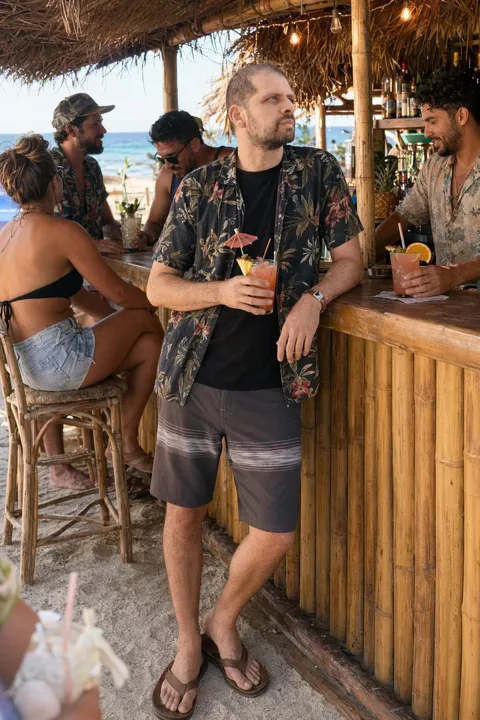 AI dating photo example: at a beach tiki bar with friends