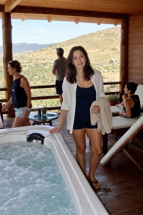 AI profile picture example: on a wooden deck beside a hot tub