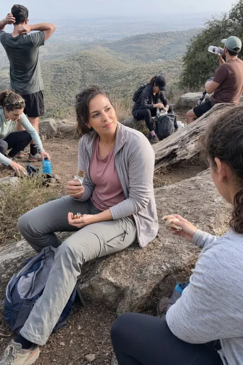AI profile picture example: taking a snack break on a trail